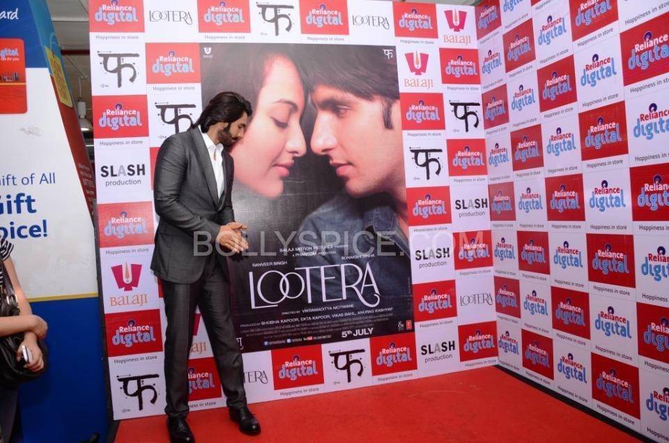 Ranveer Posing with the banner of his upcoming movie, 'Lootera'